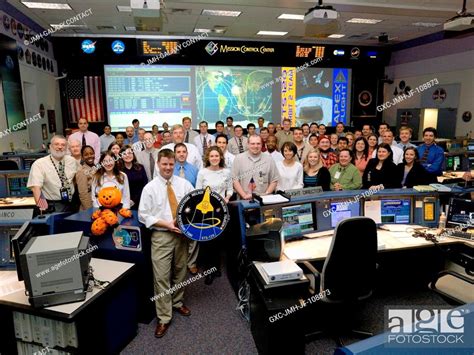 The Members Of The Sts Orbit Flight Control Team Pose For A Group