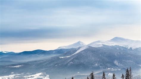 Premium Photo | Snowy mountains and clouds timelapse