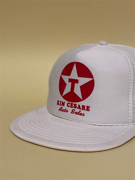 Kim Cesare Cap