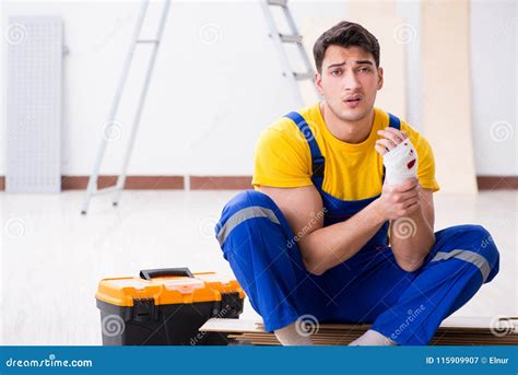 The Worker With Injured Hand At Construction Site Stock Image Image