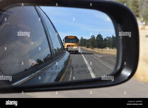 Traditional School Buses On The Road Stock Photo Alamy