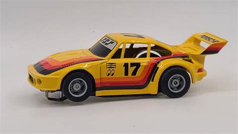 Tyco HP7 17 Porsche 935 Yellow Orange Red Black HO Slot Car EBay