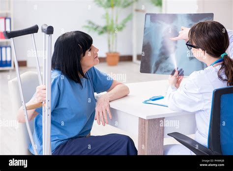 Doctor Examining Old Mature Woman After Incident Stock Photo Alamy