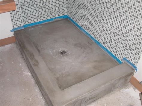 how to install a shower pan on a concrete floor