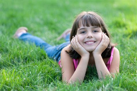 Portrait Of A Dreaming Girl On The Grass Stock Photo Image Of Rest