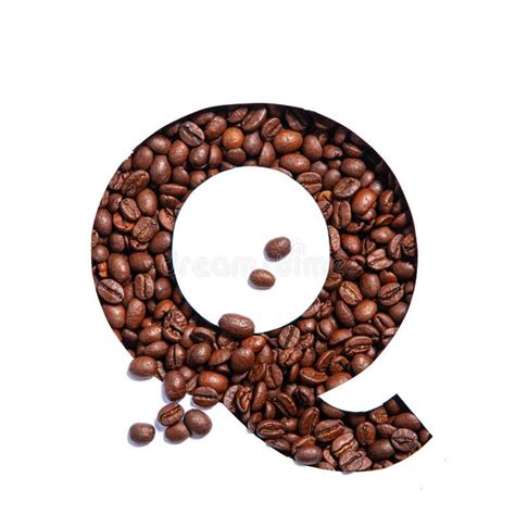 Letter Q Of English Alphabet Made Of Coffee Beans And Paper Cut