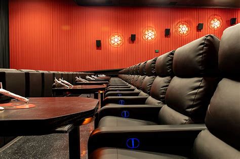 Alamo Drafthouse Lake Highlands cinema with Spectrum Eclipse recliners with custom tables ...