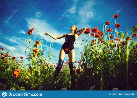 Girl In Flower Field Of Poppy Seed Stock Photo Image Of Idyllic