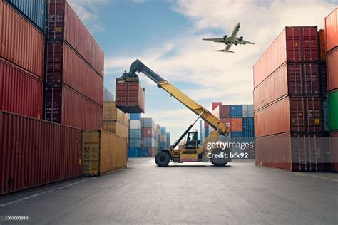 Airplane Flying Above Container Port High Res Stock Photo Getty Images