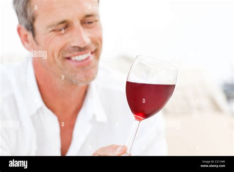 Handsome Man Drinking Some Red Wine Stock Photo Alamy