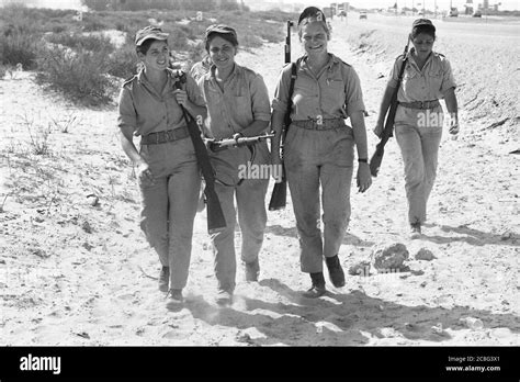 Israeli soldiers march with their rifles, during basic training, during the Yom Kippur War, the ...