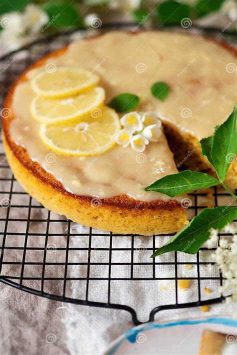 Lemon Polenta Cake Elderflower White Chocolate Ganache Stock Image Image Of Rustic White