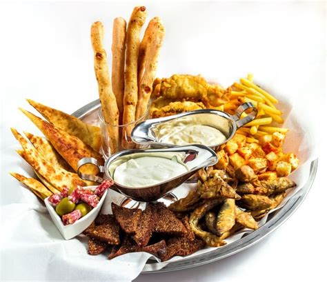 Premium Photo Large Plate With A Wide Selection Of Snacks