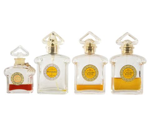 Lot - FOUR GUERLAIN PERFUME BOTTLES