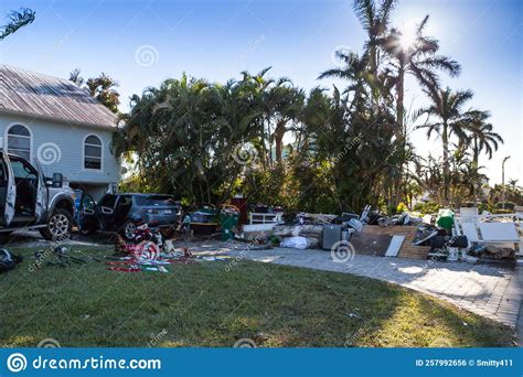 News â€ Debris Including Christmas Decorations Alongside A Flooded Out