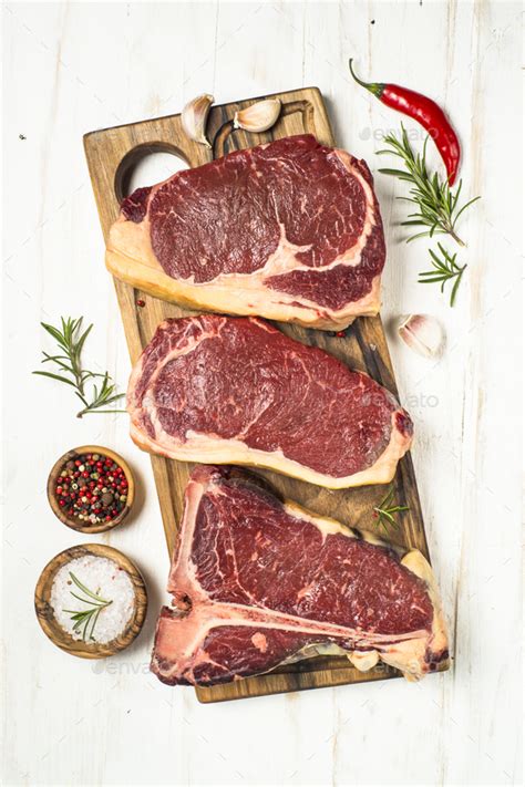 Raw Meat Beef Steak On White Top View Stock Photo By Nadianb Photodune