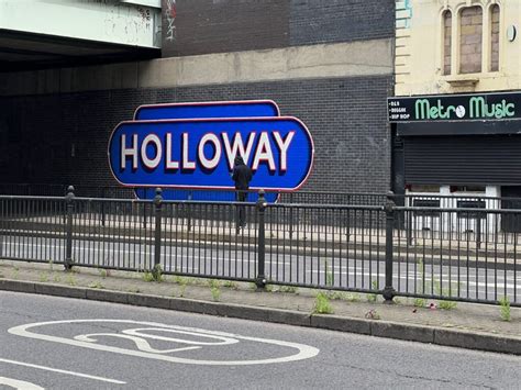 A NEW LOOK OUTSIDE HOLLOWAY ROAD TUBE - AISA