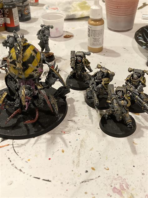 First iron warriors models. Trying to get the hang of the color scheme ...