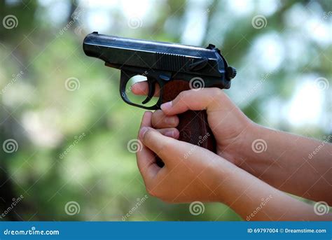 Holding A Pistol With Two Hands