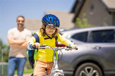 Father And Son On The Bicycle Father And Son Riding A Bike In Summer