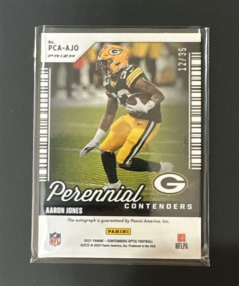 2021 Panini Contenders Optic Perennial Orange Prizm 35 Aaron Jones