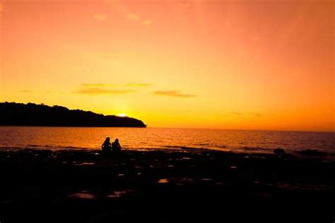 Beach Sunset Silhouette Stock Photos, Images and Backgrounds for Free ...