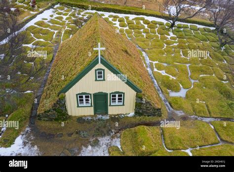 Aerial View Over Hofskirkja Turf Covered Wooden Church And Cemetery At Hof In Oeraefi Öræfi