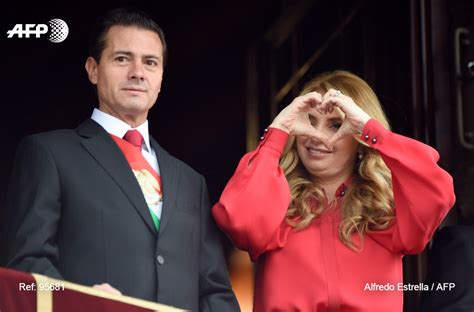 Mexico . President Enrique Pena Nieto (L) looks on as his wife Angelica ...