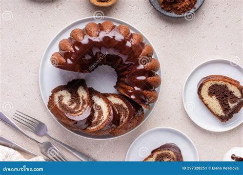 Marbled Bundt Cake Sliced On A Plate Chocolate And Vanilla Marble Cake With Chocolate Glaze