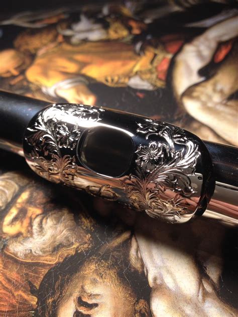 Engraved flute embouchure | Engraved flutes, Fine art jewelry, Jewelry art