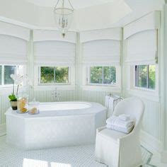 pelmets & romans add an understated elegant finish to this all white luxurious bathroom ...