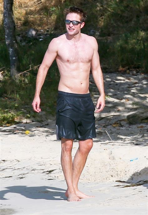 Robert Pattinson Does Shirtless Workout On Antigua Beach Pics Us Weekly