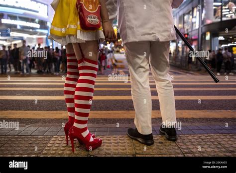 A Couple Dressed As Ronald Mcdonald And Kfc S Colonel Harland David