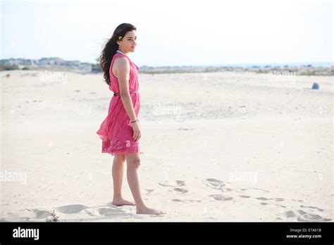 Young 12 Year Old Teen In Red Dress On The Beach Model Released Stock