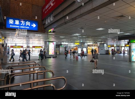 Interior of Taipei Main station building. View of lobby and shopping ...