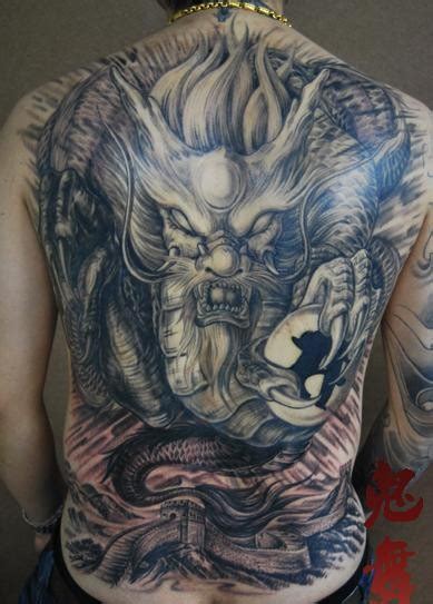 Breathtaking very detailed colored Asian evil dragon tattoo on whole ...