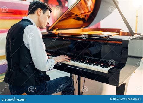 Male Pianist At The Classical Black Grand Piano Stock Image Image Of