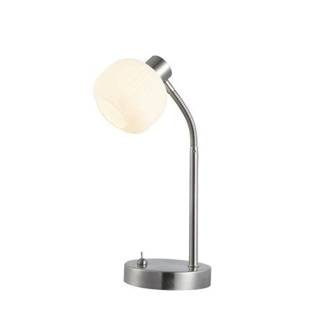 A Lamp That Is On Top Of A Metal Stand With A White Light In The Middle