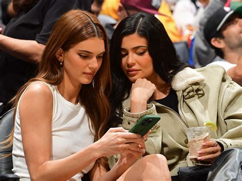 Kylie Jenner Redid Her Sister S Iconic Bikini And Boots Look Who What Wear