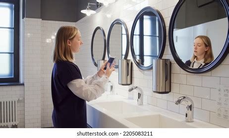 Teenage Schoolgirl Taking Selfie Campus Toilet Stock Photo 2205083211