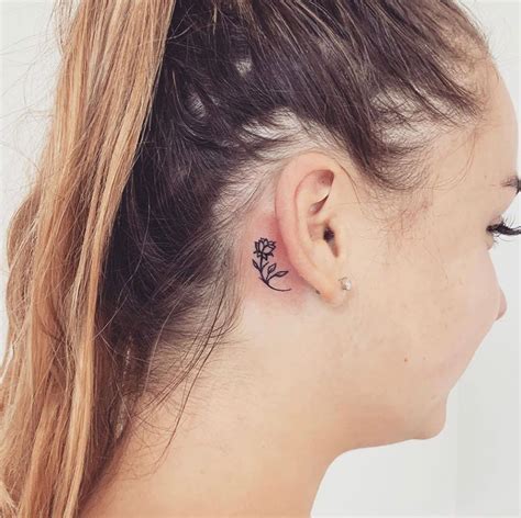 Small Flower Tattoo Behind The Ear By Hon Tattoo Tattoos Small Flower Tattoos Ear