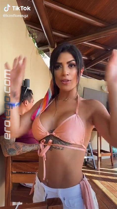 Amazing Kimberly Flores Shows Cleavage In Hot Peach Bikini Top