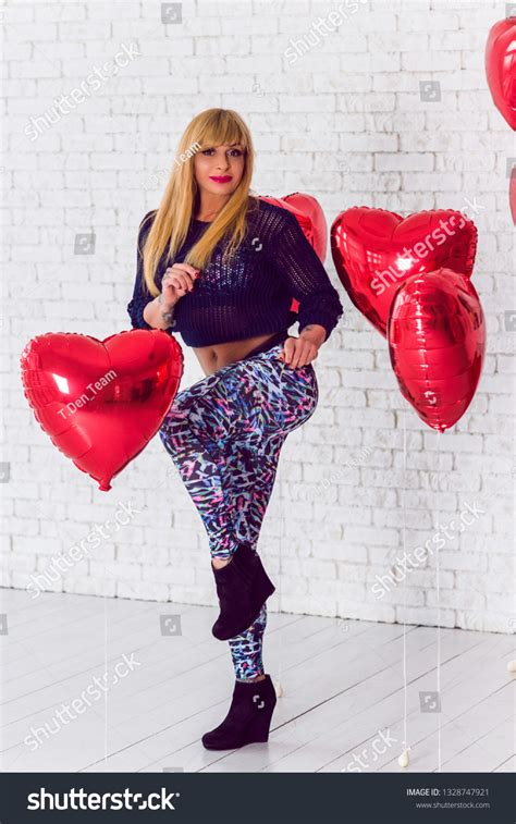 Sexy Mature Fit Athletic Woman Demonstrates Stock Photo