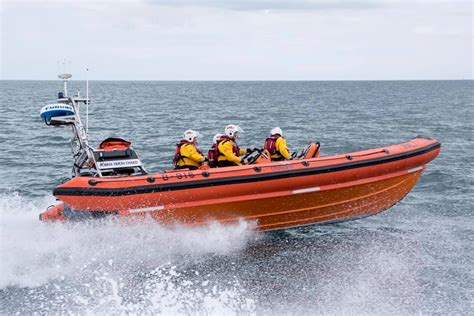 Falmouth Rnli Crew Launched To Two People Cut Off By The Tide Rnli