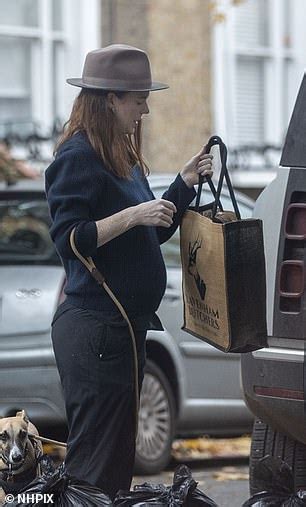 Pregnant Rose Leslie Displays Her Baby Bump As She Steps Out With