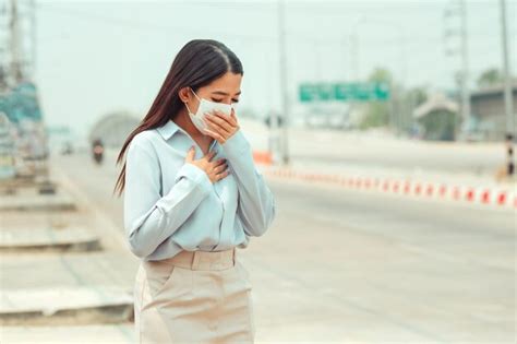 Premium Photo Asian Women Wearing Protection Mask Feels Headaches And