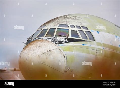 Old, shabby military transport, cargo plane close-up Stock Photo - Alamy