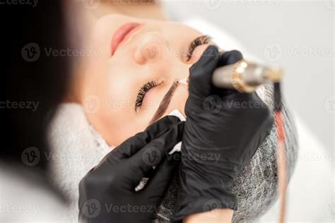 Permanent makeup on female eyebrows 21134447 Stock Photo at Vecteezy