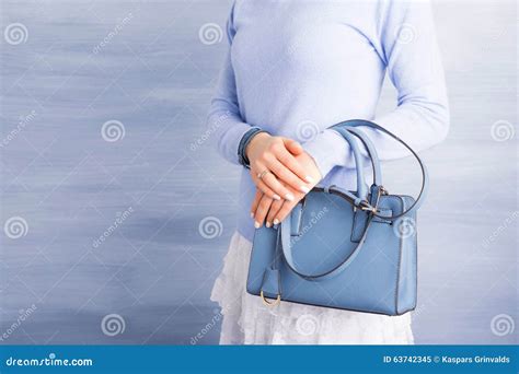 Woman Holding Blue Purse Stock Image Image Of Look Background