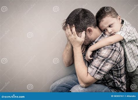 Sad Son Hugging His Dad Stock Image Image Of Fear Face